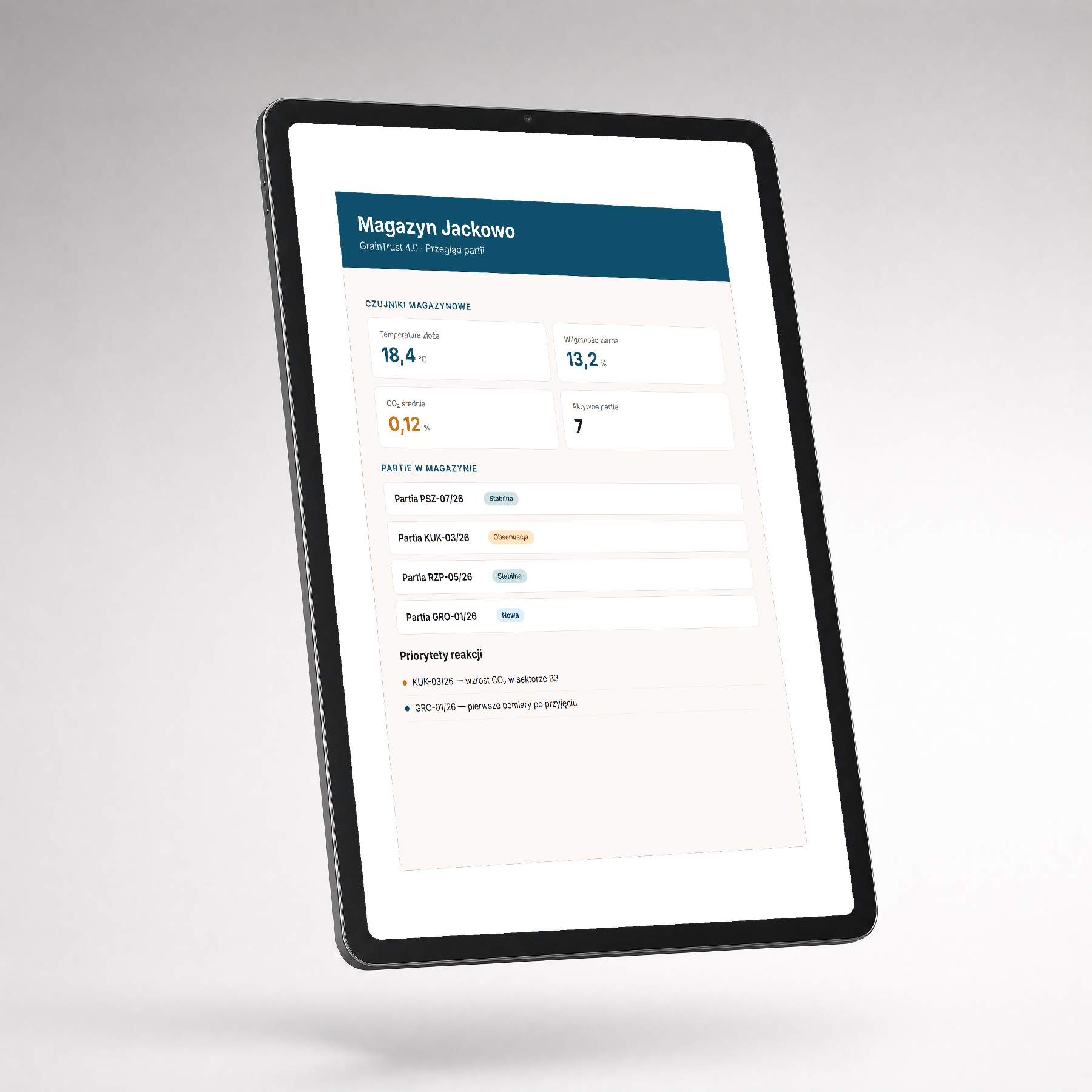 Tablet z dashboardem magazynu GrainTrust